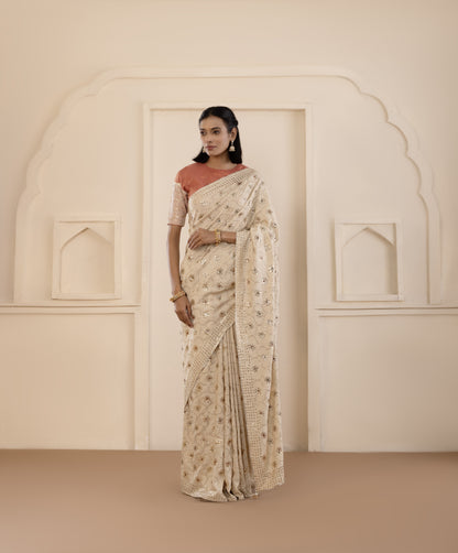 Emerald Highlighted Mukaish Muga Silk Saree