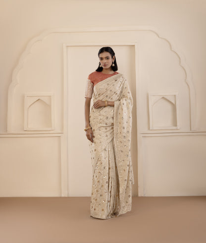 Emerald Highlighted Mukaish Muga Silk Saree
