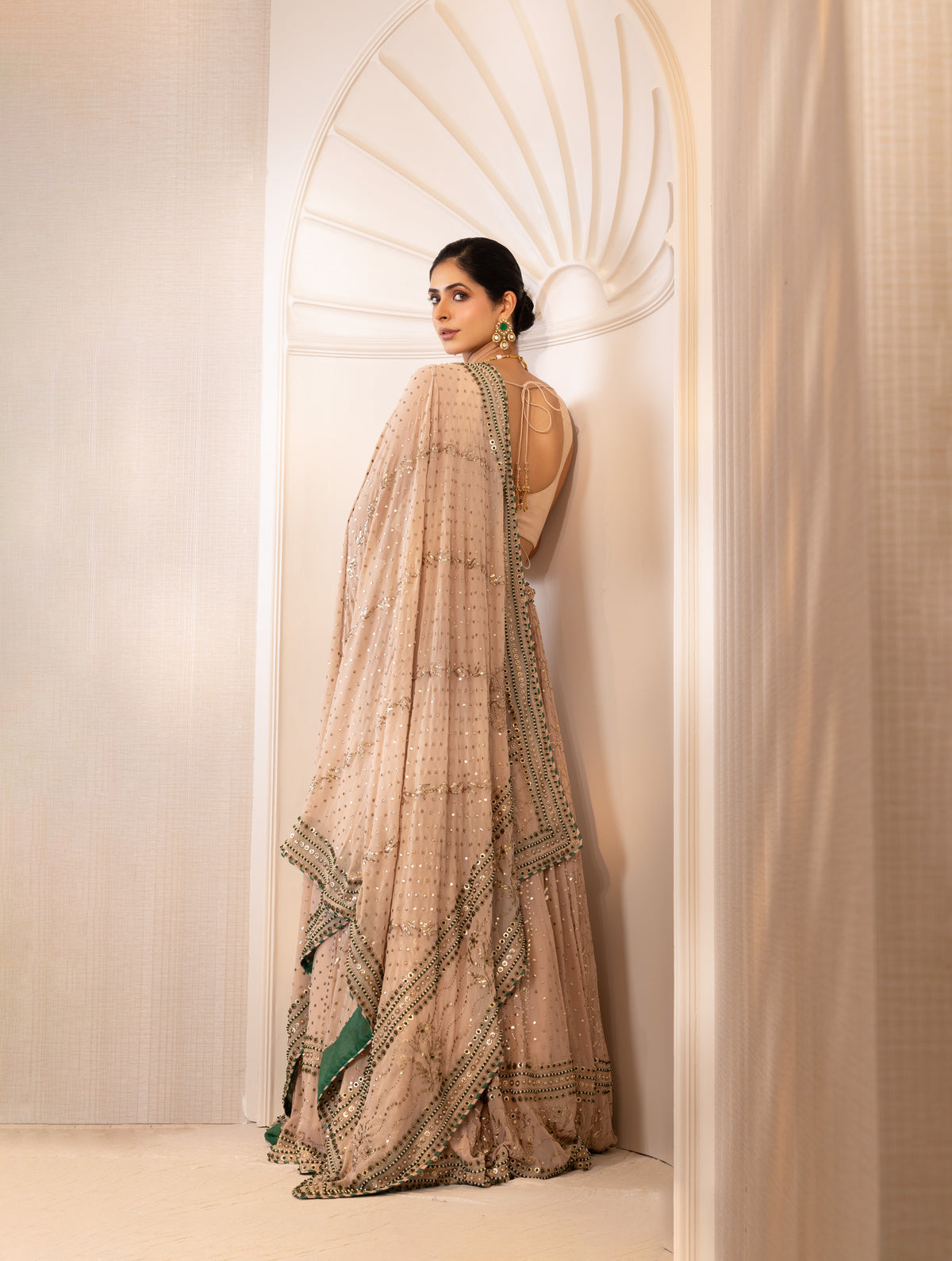 Champagne Mukaish Lehenga with Emerald Accents